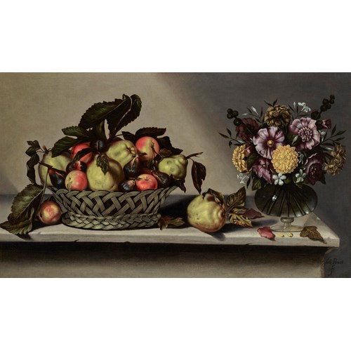 A basket of apples and quinces and flowers in a glass vase on a stone ledge